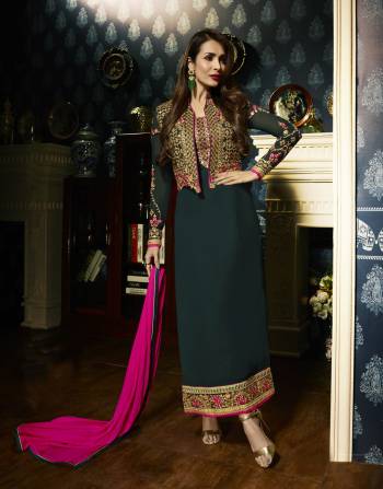 Add This Beautiful Shade Of Green With This Designer Straight Cut Suit In Pine Green Color Paired With pine Green Colored Bottom And Contrasting Fuschia Pink Colored Dupatta. Its Top Is Fabricated On Georgette Paired With Santoon Bottom And Chiffon Dupatta. It Is Light Weight And Easy To Carry All Day Long.