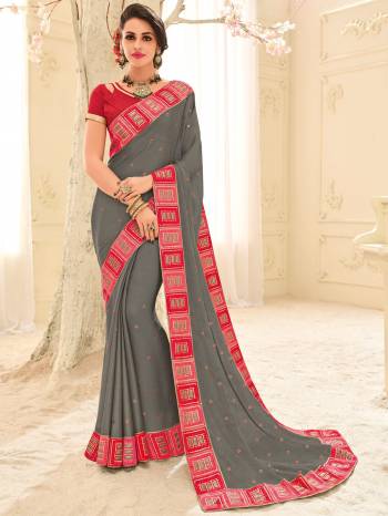 Presenting this grey color silk chiffon fabric saree. Ideal for party, festive & social gatherings. this gorgeous saree featuring a beautiful mix of designs. Its attractive color and designer patch, stone, floral design work over the attire & contrast hemline adds to the look. Comes along with a contrast unstitched blouse.