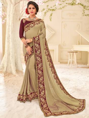 Presenting this Light Khaki color two tone moss chiffon saree. Ideal for party, festive & social gatherings. this gorgeous saree featuring a beautiful mix of designs. Its attractive color and designer patch, stone, floral design work over the attire & contrast hemline adds to the look. Comes along with a contrast unstitched blouse.