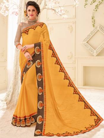 Gorgeously mesmerizing is what you will look at the next wedding gala wearing this beautiful Yellow color Silk Chiffon saree. Ideal for party, festive & social gatherings. this gorgeous saree featuring a beautiful mix of designs. Its attractive color and designer patch, stone, floral design work over the attire & contrast hemline adds to the look. Comes along with a contrast unstitched blouse.