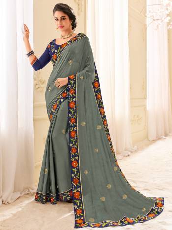 Attractively Gorgeous mesmerizing is what you will look at the next wedding gala wearing this beautiful grey color two tone chiffon pattern saree. Ideal for party, festive & social gatherings. this gorgeous saree featuring a beautiful mix of designs. Its attractive color and designer patch, stone, floral design work over the attire & contrast hemline adds to the look. Comes along with a contrast unstitched blouse.