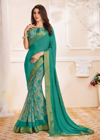 For Your Regular Wear, Grab This Simple Saree In Turquoise Blue Color Paired With Turquoise Blue Colored Blouse. This Saree And Blouse are Fabricated On Georgette Beautified With Prints And Lace Border. Buy It Now.