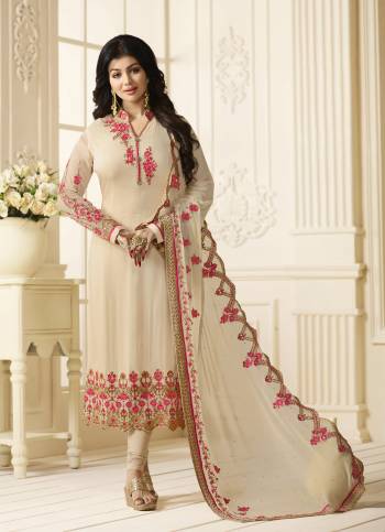 Simple And Elegant Looking Designer Straight Cut Suit In Cream Color Paired With Cream Colored Bottom And Dupatta. Its Top Is Fabricated On Georgette Paired With With Santoon Bottom And Chiffon Dupatta. Its Has Beautiful Contrasting Embroidery Over Top And Dupatta. Buy Now.