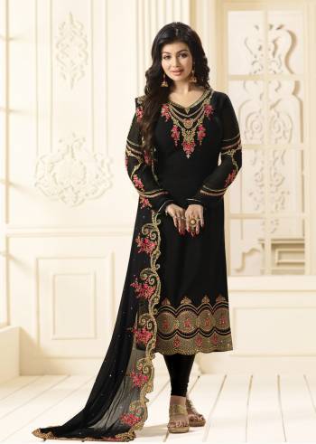 Enhance Your Beauty Wearing This Designer Straight Cut Suit In Black Color Paired With Black Colored Bottom And Dupatta. Its Top Is Fabricated On Georgette Paired With Santoon bottom And Chiffon Dupatta. It Has Heavy Embroidery Over The Top And Dupatta. Buy Now.