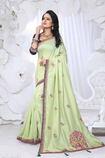 Look Pretty And Earn Lots Of Compliments Wearing This Saree In Pastel Green Color Paired With Contrasting Navy Blue Colored Blouse. This Saree Is Fabricated On Soft Silk Paired With Art Silk Fabricated Blouse. This Saree Is Fabricated On Soft Silk Paired With Art Silk Fabricated Blouse. It Has Pretty Embroidery Over The Saree. 