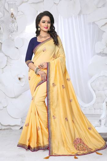 Celebrate This Festive Seson Wearing This Saree In Yellow Color Paired With Contrasting Navy Blue Colored Blouse. This Saree Is Fabricated On Soft Silk Paired With Art Silk Fabricated Blouse. This Saree Is Suitable For Any Festive Or Party Wear.