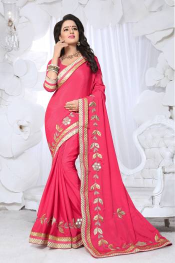 Get Ready For The Next Functiion At Your Place Wearing This Saree In Pink Color Paired With Pink Colored Blouse. This Saree Is Fabricated On Chinon Silk Paired With Art Silk Fabricated Blouse. Its Has Fancy Embroidery Over The Saree Border.