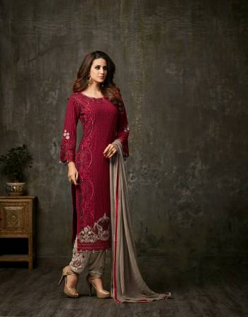 Adorn The Royal Look Wearing This Designer Staright Cut Suit In Maroon Colored Top Paired With Contrasting Grey Colored Bottom And Dupatta. Its Top Is Fabricated On Georgette Paired With Embroidred Santoon Bottom And Chiffon Dupatta. Buy This Designer Suit Now.