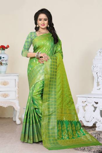 Grab This Saree In Green Color Paired With Green Colored Blouse. This Saree And Blouse Are Fabricated On Banarasi Art Silk Beautified With Weave All Over. This Saree Is Light In Weight And Easy To Drape. Buy Now.