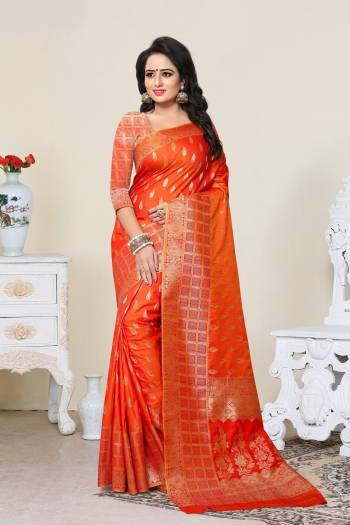 Shine Bright Wearing This Saree In Bright Orange Color Paired With Orange Colored Blouse. This Saree And Blouse Are Fabricated On Banarasi Art Silk Beautified With Weave. It Is Easy To Drape And Durable.