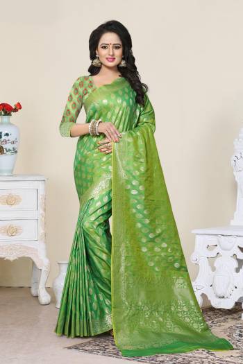 Grab This Saree In Green Color Paired With Green Colored Blouse. This Saree And Blouse Are Fabricated On Banarasi Art Silk Beautified With Weave All Over. This Saree Is Light In Weight And Easy To Drape. Buy Now.