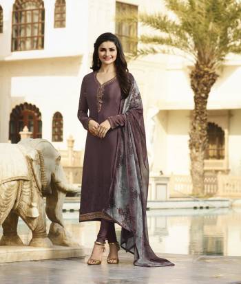 Add This Lovely Shade To Your Wardrobe With This Designer Straight Cut Suit In Wine Color Paired With Wine Colored Bottom And Dupatta. Its Top And Bottom Are Fabricated On Crepe Paired With Chiffon Dupatta. Its Has Minimal Elegant Embroidery Making The Suit Pretty.