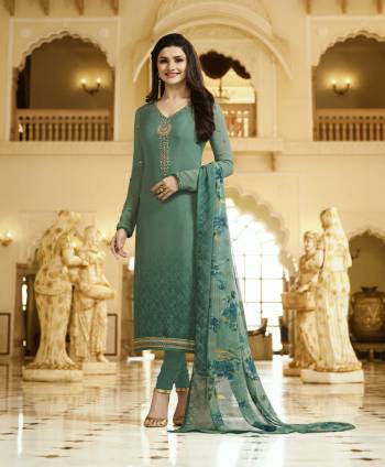 Simple And Elegant Looking Designer Straight Cut Suit Is Here In Sea Green Color Paired With Sea Green Colored Bottom And Dupatta. Its Top And Bottom are Fabricated On Crepe Paired With Chiffon Dupatta. Its Has Printed Dupatta With Embroidered Top.