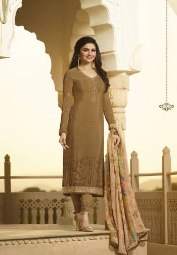 Wear This Lovely Suit At The Next Party You Attend, Grab This Straight Cut Suit In Light Brown Color Paired With Light Brown Colored Bottom And Beige Colored Dupatta. Its Top And Bottom Are Fabricated On Crepe Paired With Chiffon Dupatta. 