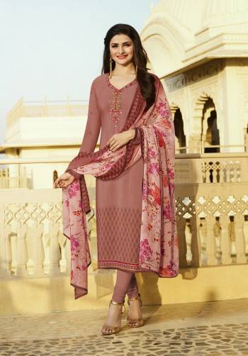 Look Pretty In This Prettiest Shade Of Pink With This Straight Cut Suit In Dusty Pink Color Paired With Dusty Pink Colored Bottom And Light Pink Colored Dupatta. Its Top And Bottom Are Fabricated On Crepe Paired With Chiffon Dupatta. Its All Three Fabrics Enusres Superb Comfort All Day Long. Buy This Designer Suit Now.