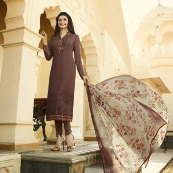 Enhance Your Beauty Wearing This Dark Shade In Dark Brown Colored Designer Straight Cut Suit Paired With Dark Brown Colored Bottom And Grey Colored Dupatta. Its Top And Bottom Are Fabricated On Crepe Paired With Chiffon Dupatta. It Has Floral Printed Dupatta And Embroidered Top. Buy Now.