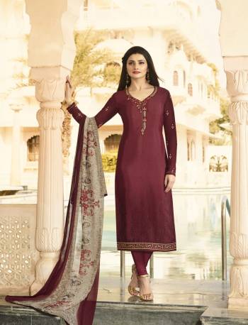 Rich And Elegant Looking Suit Is Here In Maroon Colored Top Paired With Maroon Colored Bottom And Contrasting Grey Colored Dupatta. Its Top And Bottom Are Fabricated On Crepe Paired With Chiffon Dupatta. It Is Light Weight And Easy To Carry Throughout The Gala.