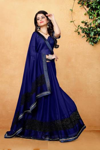 Enhance Your Personality wearing This Saree In Dark Blue Color Paired With Dark Blue Colored Blouse. This Saree Is Fabricated On Satin Paired With Art Silk Fabricated Blouse. It Is Soft Towards Skin and easy To Carry All Day Long.