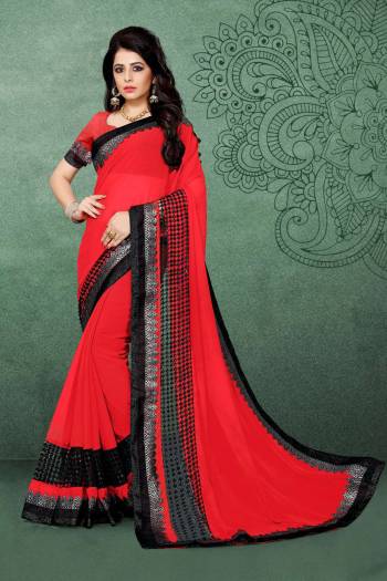 Adorn The Aneglic Look wearing This Elegant Saree In Red Color Paired With Red Colored Blouse. This Saree Is Fabricated On Chiffon Paired With Art Silk Fabricated Blouse. It Has Fancy Lace Border. Also Its Light Weight And Easy To Carry All Day Long.