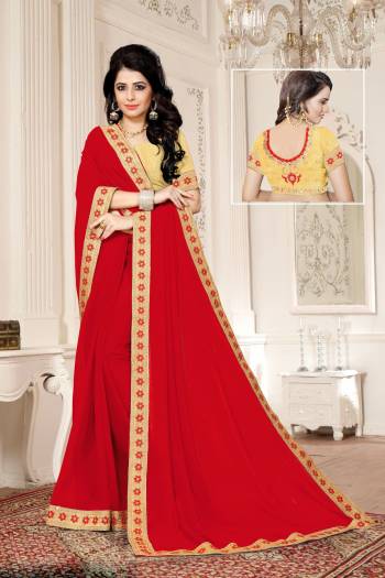 Adorn The Angelic Look Wearing This Saree In Red Color Paired With Beige Colored Blouse. This Saree Is Fabricated On Georgette Paired With Art Silk Fabricated Blouse. It Has Embroidery Over the Blouse And Lace Border. 