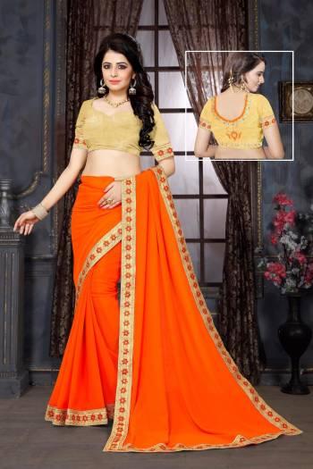 Orange Color Induces Perfect Summery Appeal To Any Outfit, So Grab This Attractive Saree In Orange Color Paired With Orange Colored Blouse. This Saree Is Fabricated On Georgette  Paired With Art Silk Fabricated Blouse Beautified With Fancy Lace Border.