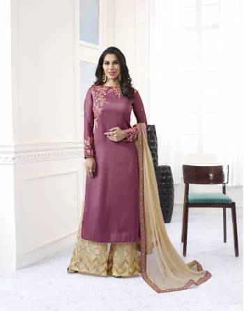 Look Beautiful Wearing This Plazzo Suit In Light Purple Colored Top Paired With Beige Colored Plazzo And Dupatta. Its Top Is Fabricated On Satin Paired With Net Plazzo And Chiffon Dupatta. All Three Fabrics Are Light Weight And Durable.