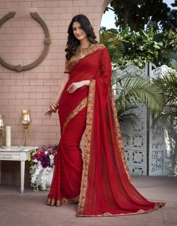 Adorn The Angelic Look Wearing This Saree In Red Color Paired With Multi Colored Blouse. This Saree Is Fabricated On Georgette Paired With Satin Fabricated Blouse. This Pretty Saree Can Be Wore At Any Festival Or Semi-Casually.