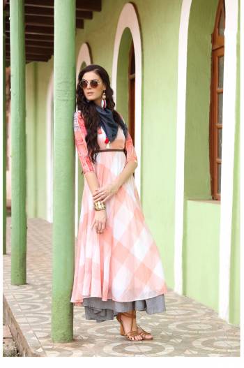 Beautiful Patterned Readymade Kurti Is Here In Light Peach And Grey Color Fabricated On Soft Cotton. This Kurti Is Long Enough And Gives A Rich Look To Your Personality. Buy It Now.