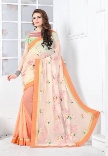 Most Running And Demanding Color Of The Season Is Here With This Saree In Peach Color Paired With Contrasting Pastel Green Colored Blouse. Its Blouse Is Fabricated On Georgette Paired With Art Silk Fabricated Blouse. It Is Light Weight And Easy To Carry All Day Long.