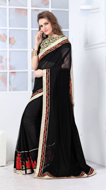 Enhance Your Beauty Wearing This Black Color Paired With Black Colored Blouse. This Saree Is Fabricated On Georgette Paired With Art Silk Fabricated Blouse. It Has Heavy Embroidery Over The Blouse And Saree Lace Border.