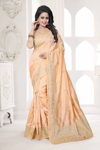 Flaunt Your Rich And Elegant Taste Wearing This Saree In Beige Color Paired With Beige Colored Blouse. This Saree And Blouse Are Fabricated On Art Silk Beautified with Jari Work. It Is Easy To Drape And Gives Your Personality A Very Sophisticated Look.