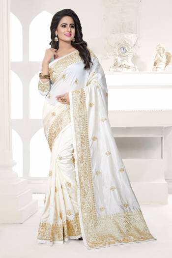 Simple And Elegant Colored Saree Is Here In White Color Paired With White Colored Blouse. This Saree And Blouse Are Fabricated On Art Silk Beautified With Jari Embroidery. This Silk Saree Will Give A Rich Look To Your Personality.