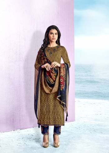 Buy This Designer Straight Cut Suit In Olive Green Colored Top Paired With Contrasting Blue Colored Bottom And Multi Colored Dupatta. Its Top And Bottom Are fabricated On Cotton Paired With Chiffon Dupatta. Its Has Prints All Over With Thread Work At The Neck Line.