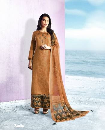 Flaunt Your Rich and Elegant Taste wearing This Straight Cut Suit In Beige Color Paired With Multi Colored Bottom And Beige Colored Dupatta. Its Top and Bottom Are Fabricated On Cotton Paired With Chiffon Dupatta. Both Its Fabrics Ensures Superb Comfort All Day Long. Buy Now.