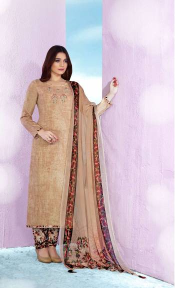 Flaunt Your Rich and Elegant Taste wearing This Straight Cut Suit In Beige Color Paired With Multi Colored Bottom And Beige Colored Dupatta. Its Top and Bottom Are Fabricated On Cotton Paired With Chiffon Dupatta. Both Its Fabrics Ensures Superb Comfort All Day Long. Buy Now.