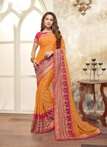 Celebrate This Festive Season Wearing This Saree In Attractive Color With This Musturd Yellow Colored Saree Paired With Contrasting Dark Pink Colored Blouse. This Saree Is Fabricated On Chiffon Paired With Art Silk Fabricated Blouse. Buy This Designer Saree Now.