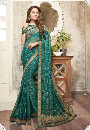 Add This New Shade Of Blue To Your Wardribe In This Teal Blue Colored Saree Paired With Teal Blue Colored Blouse. This Saree Is Fabricated On Chiffon Paired With Art Silk Fabricated Blouse. This Saree Is In Weight And Easy To Carry All Long.