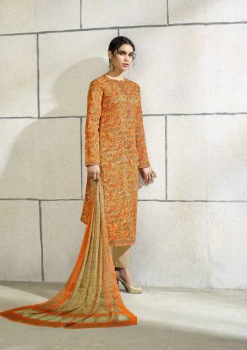 Shine Bright With This Dress Material In Orange Color Paired With Beige Colored Bottom And Beige And Orange Dupatta. It Top And Bottom Are Fabricated On Cotton Paired With Chiffon Dupatta. It Is Light Weight And Ensures Superb Comfort All Day Long.