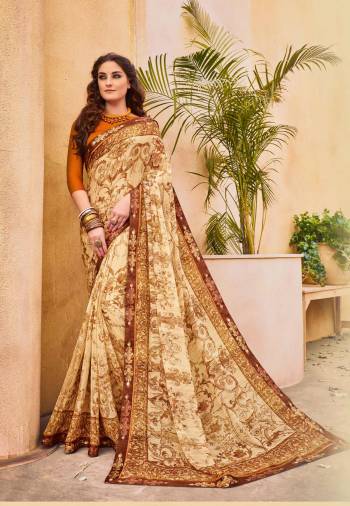 Flaunt Your Rich And Elegant Taste Wearing This Beige Colored Saree Paired With Contrasting Rust Colored Blouse. This Saree Is Fabricated On Georgette Paired With Satin Silk Fabricated Blouse. Both Its Fabrics Are Soft Towards Skin and Easy To carry all Day Long.