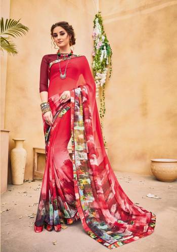 Here Is An Attractive Saree In Pink Color Paired With Wine Colored Blouse. This Saree Is Fabricated On Georgette Paired With Art Silk Fabricated Blouse. It Has Beautiful Prints All Over The Saree. Buy This Saree Now.