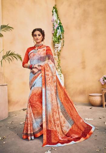 For Your Casual Or Semi-Casual Wear, Grab This saree In Rust Orange and Grey Color Paired With Orange Colored Blouse, This Saree Is Fabricated On Georgette Paired With Satin Silk Blouse. It Is Easy To Drape And Carry All Day Long.