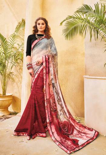 Look Pretty Wearing This Saree In Grey And Maroon Color Paired With Black Colored Blouse. This Saree Is Fabricated On Georgette Paired with Art Silk Fabricated Blouse. It Has Beautiful Mix Match Of Colors Which Will earn you Lots Of Compliments From Onlookers.