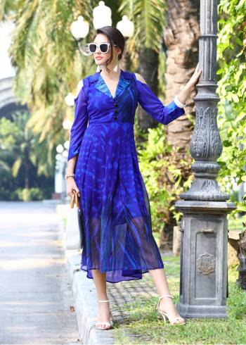 Attract All Wearing This Attractive Colored Kurti In Royal Blue. This Kurti Is Fabricated On Georgette Beautified with Prints All Over. It Is Light In Weight And Easy To Carry All Day Long. Buy Now.