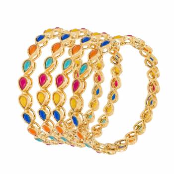 Get This Amazing Bangles Set In A Set Of Four. It Is In Golden Color Beautified With Multi Colored Stones. These Can Be Paired With Any Traditional Attire Or As Semi-Casuals.