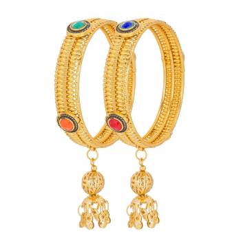 Beautiful And Heavy Looking Bangles Set Is Here Which Can Be Paired With Lehenga Or Saree. It Is In golden color With Stone Work And Hangings. Buy It Now.