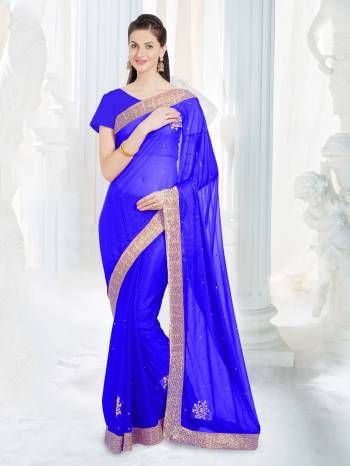 Attract All Wearing This Saree In Royal Blue Color Paired With Royal Blue Colored Blouse.  This Saree Is Fabricated On Net Lycra Paired With Art Silk Fabricated Blouse. It Is Beautified With Stone Work & Lace Border. 