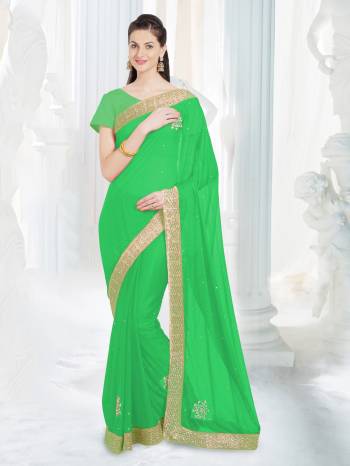 Here Is A Pretty And Light Weight Saree Which Ensures You Beauty And Comfort. Grab This Saree In Green Color Paired With Green Colored Blouse. This Saree Is Fabricated On Net Lycra Paired With Art Silk Fabricated Blouse. Buy This Saree Now.