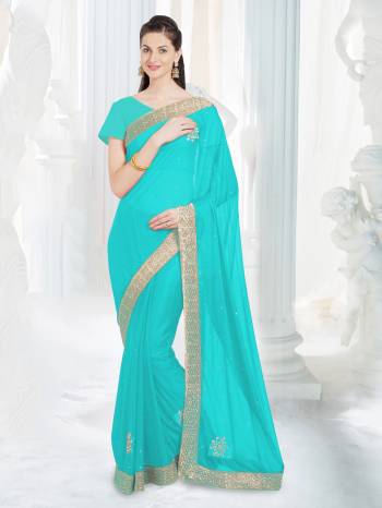 Simple And Elegant Looking Saree Is Here In Turquoise Blue Color Paired With Turquoise Blue Colored Blouse. This Saree Is Fabricated On Net Lycra Paired With Art Silk Fabricated Blouse. It Is Light Weight And Easy To Carry All Day Long.