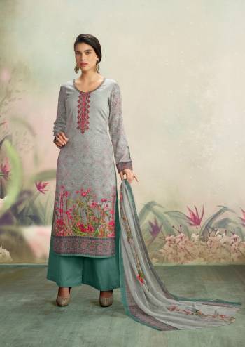 If Those Readymade Suits Does Not Lend You The Desired Comfort, Than Grab This Dress Material In Grey Colored Top Paired With Paired With Light Blue Colored Bottom And Grey Dupatta. Get This Stitched As Per Your Desired Fit And Comfort.