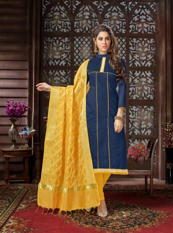 For A Trendy And Elegant Look, Grab This Dress Material In Navy Blue Colored Top Paired With Contrasting Yellow Colored Bottom And Dupatta. Its Top Is Fabricated On Cotton Silk Paired With Cotton Bottom And Banarasi Jacquard Dupatta. All Three Fabrics Ensures Superb Comfort All Day Long.